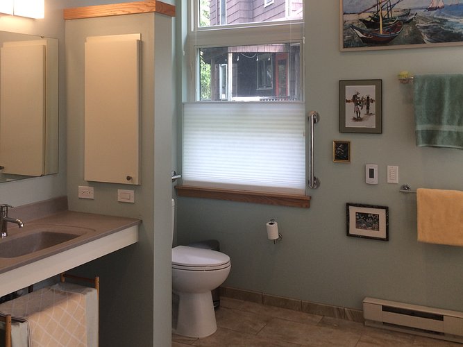 Large bathroom with ADA compliances