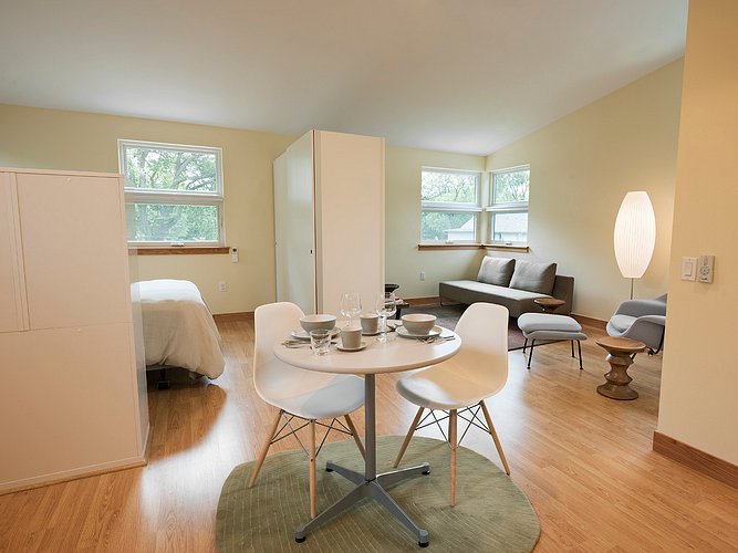 Dining area with view of living area in ACU